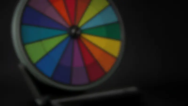 A large studio wheel fills the frame on a LakhBet game show set.